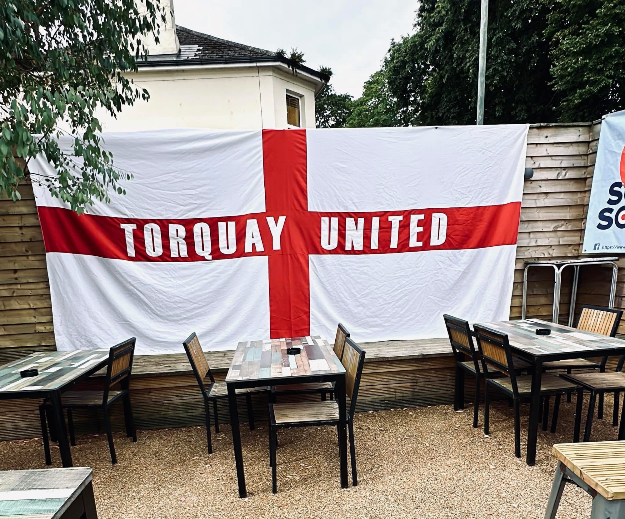 Torquay United flag in St Marychurch ahead of matchday